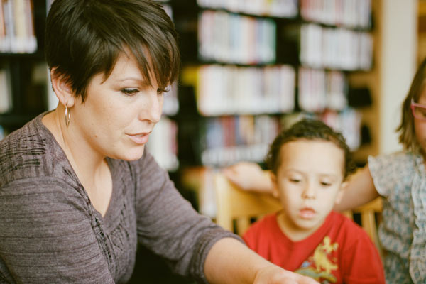 Volunteer reading to children